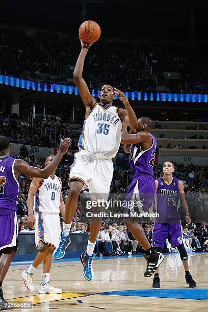 Kevin Durant of the Oklahoma City Thunder puts up a shot against Desmond Mason of the Sacramento Kings during the game on October 28, 2009 at the...