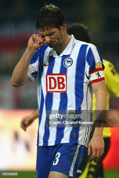 Arne Friedrich of Berlin looks dejected during the Bundesliga match between Borussia Dortmund and Hertha BSC Berlin at the Signal Iduna Park on...