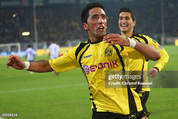 Lucas Barrios of Dortmund celebrates the second goal with Nuri Sahin during the Bundesliga match between Borussia Dortmund and Hertha BSC Berlin at...