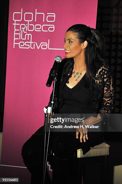 Comedian Maysoon Zayid performs onstage at Comedy Night at the W Hotel Doha during the 2009 Doha Tribeca Film Festival on October 30, 2009 in Doha,...