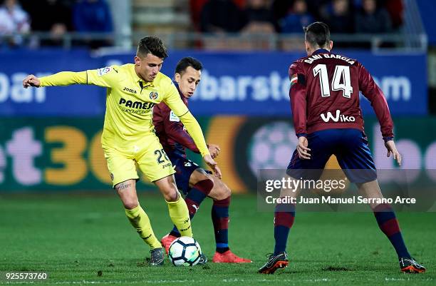 Fabian Orellana of SD Eibar duels for the ball with Daniel Rabaseda of Villarreal CF during the La Liga match between SD Eibar and Villarreal CF at...
