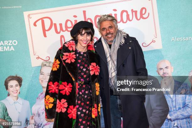 Dino Abbrescia and Dino Abbrescia attend a photocall for 'Puoi Baciare Lo Sposo' on February 28, 2018 in Milan, Italy.