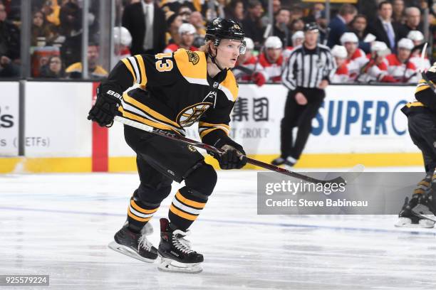 Danton Heinen of the Boston Bruins skates against the Carolina Hurricanes at the TD Garden on February 27, 2018 in Boston, Massachusetts.