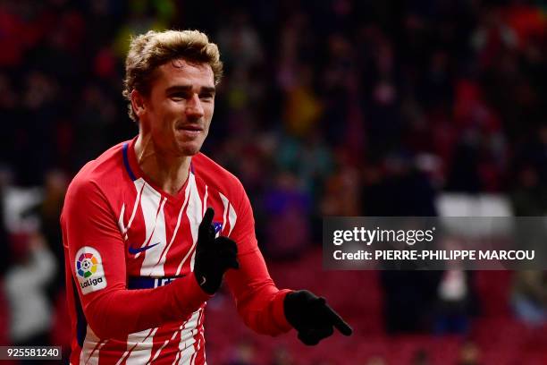 Atletico Madrid's French forward Antoine Griezmann celebrates his third goal during the Spanish league football match Club Atletico de Madrid against...