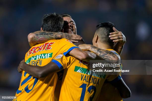 Enner Valencia of Tigres celebrates with teammates after scoring the first goal of his team during the second leg match between Tigres UANL and...