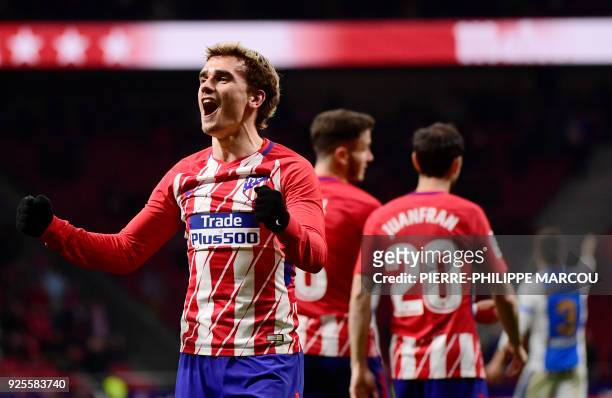Atletico Madrid's French forward Antoine Griezmann celebrates his third goal during the Spanish league football match Club Atletico de Madrid against...