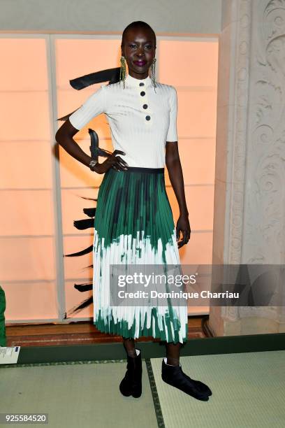 Alek Wek attends the H&M show as part of the Paris Fashion Week Womenswear Fall/Winter 2018/2019 on February 28, 2018 in Paris, France.