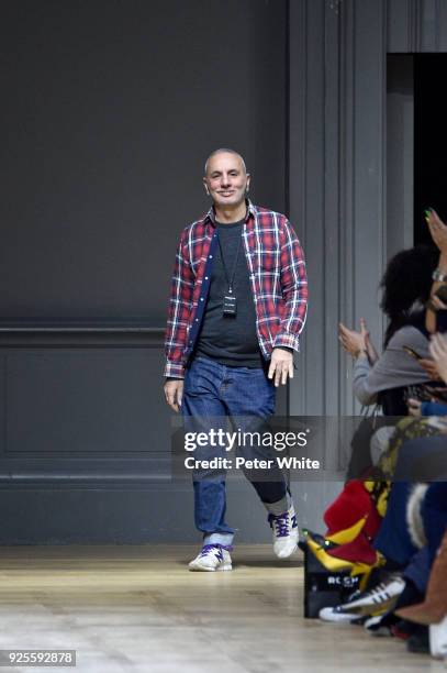 Fashion designer Alessandro Dell Acqua walks the runway after the Rochas show as part of the Paris Fashion Week Womenswear Fall/Winter 2018/2019 on...