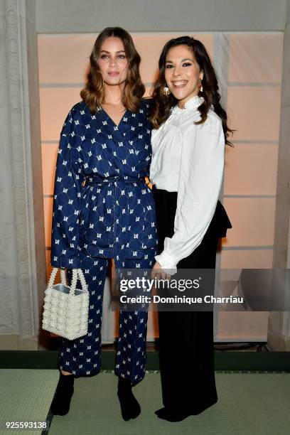 Marie-Ange Casta and Alyson Paradis attend the H&M show as part of the Paris Fashion Week Womenswear Fall/Winter 2018/2019 on February 28, 2018 in...
