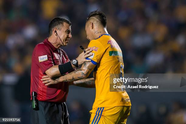 Referee Joel Aguilar argues with Eduardo Vargas of Tigres during the second leg match between Tigres UANL and Herediano as part of round of 16 of the...