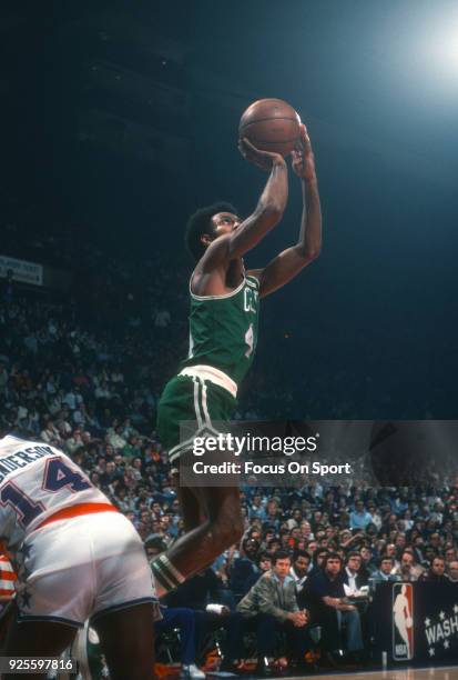 Dave Bing of the Boston Celtics shoots against the Washington Bullets during an NBA basketball game circa 1977 at the Capital Centre in Landover,...