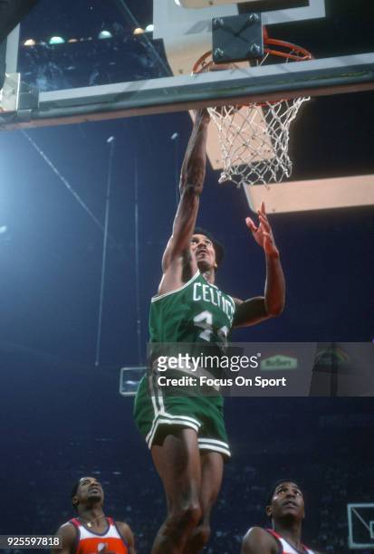 Dave Bing of the Boston Celtics goes in for a layup the Washington Bullets during an NBA basketball game circa 1977 at the Capital Centre in...