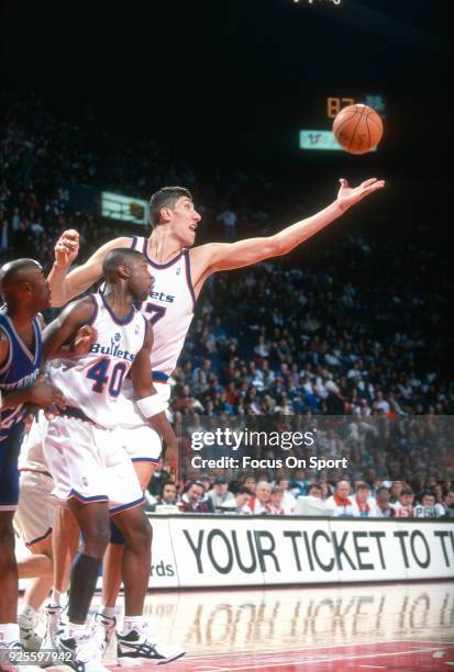 Gheorghe Muresan of the Washington Bullets in action against the Charlotte Hornets during an NBA basketball game circa 1995 at the US Airways Arena...