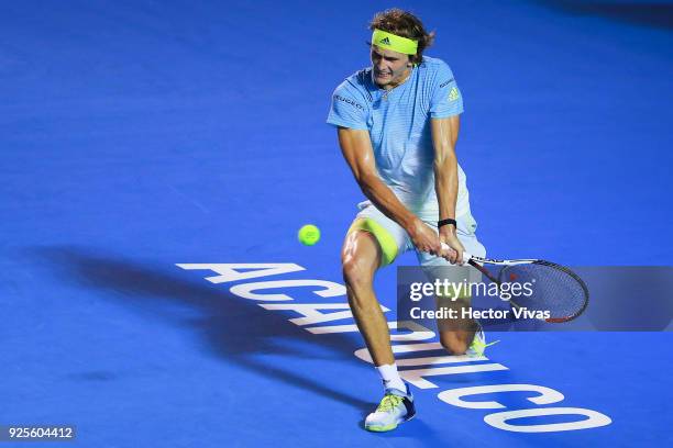 Alexander Zverev of Germany takes a backhand shot during a match between Steve Johnson of United States and Alexander Zverev of Germany as part of...