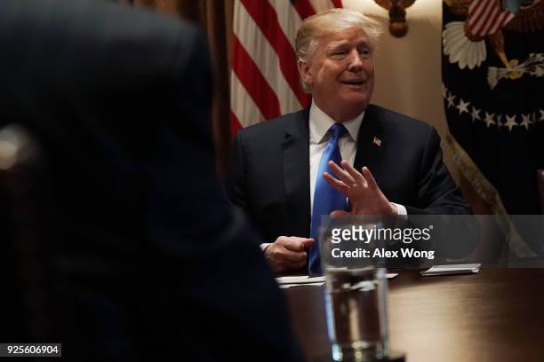 President Donald Trump speaks during a meeting with bipartisan members of the Congress at the Cabinet Room of the White House February 28, 2018 in...