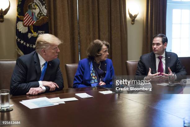 Senator Marco Rubio, a Republican from Florida, from right, speaks as Senator Dianne Feinstein, a Democrat from California, and U.S. President Donald...