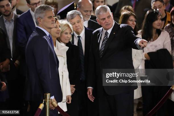 Steve Case and his wife Jean Case, Greta Van Susteren and her husband John Coale are joined by Franklin Graham as Graham's father Christian...