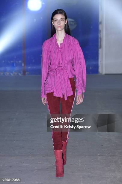 Model walks the runway during the Ben Taverniti Unravel Project show as part of Paris Fashion Week Womenswear Fall/Winter 2018/2019 on February 28,...