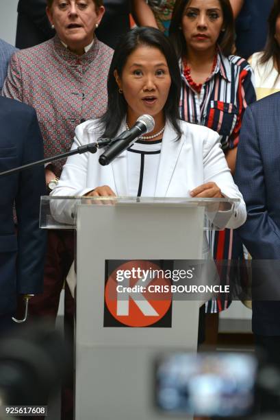 The leader of Peru's Fuerza Popular party Keiko Fujimori along with members of the executive committee of her party, addresses the press in Lima on...