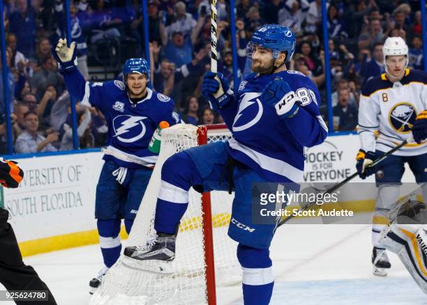 Cory Conacher of the Tampa Bay Lightning celebrates his goal against goalie Chad Johnson of the Buffalo Sabres during the first period at Amalie...