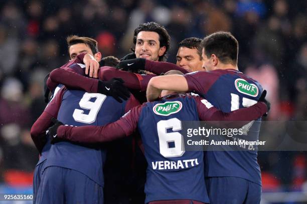 Javier Pastore of Paris Saint-Germain and teammates congratulate Edinson Cavani for his goal during the French Cup match between Paris Saint-Germain...