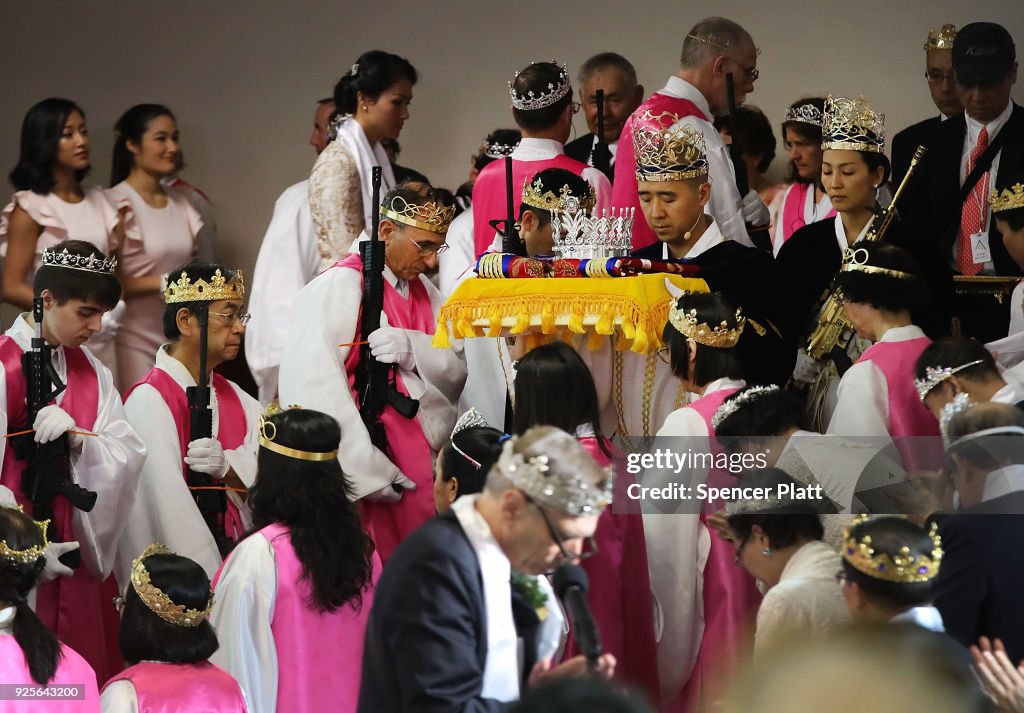 World Peace And Unification Sanctuary Religious Group Holds Blessing Ceremony For Couples And Their AR-15 Rifles