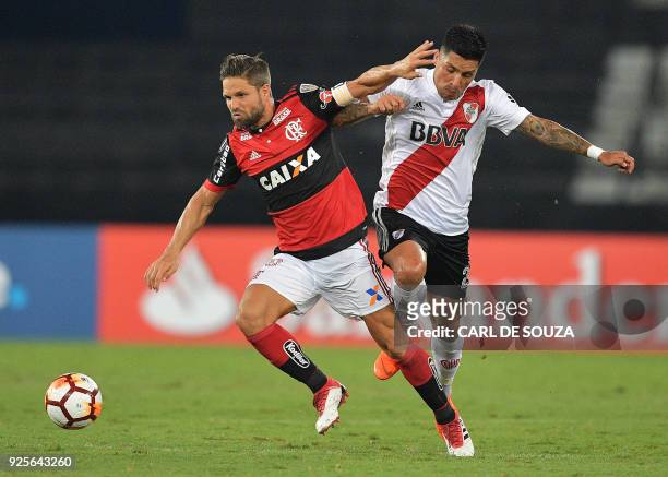 Brazil's Flamengo player Diego vies for the ball with Argentina's River Plate Enzo Perez, during their group stage Copa Libertadores football match...