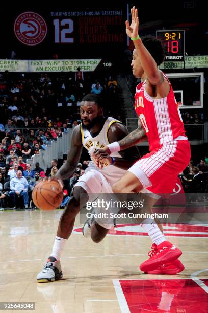 Lance Stephenson of the Indiana Pacers drives to the basket against the Atlanta Hawks on February 28, 2018 at Philips Arena in Atlanta, Georgia. NOTE...