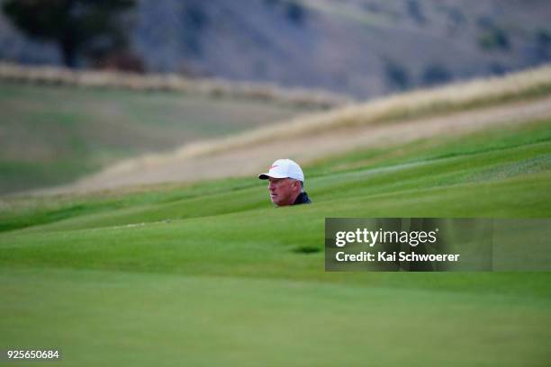 Former English cricketer Sir Ian Botham looks on during day one of the ISPS Handa New Zealand Golf Open at The Hills Golf Club on March 1, 2018 in...