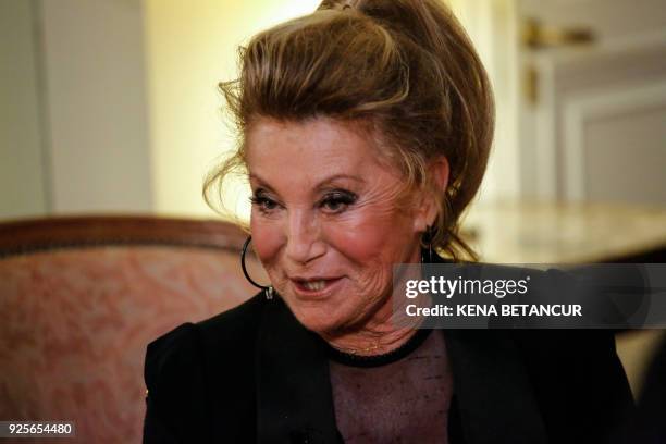 French singer Sheila speaks during an interview at the French Consulate in New York on February 28, 2018. / AFP PHOTO / KENA BETANCUR