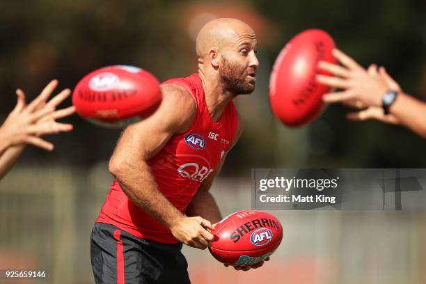 Jarrad McVeigh of the Swans takes part in a drill during a Sydney Swans AFL training session at Lakeside Oval on March 1, 2018 in Sydney, Australia.