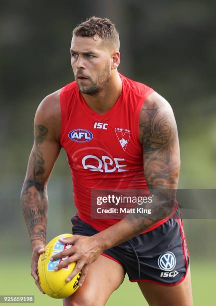 Lance Franklin of the Swans handles the ball during a Sydney Swans AFL training session at Lakeside Oval on March 1, 2018 in Sydney, Australia.