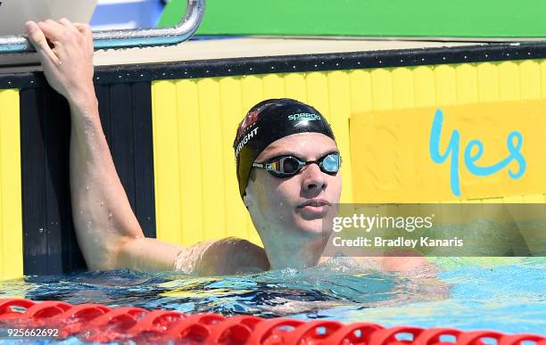 Jack Cartwright checks his time after competing in the heats of the Men's 100m Freestyle event during the 2018 Australia Swimming National Trials at...