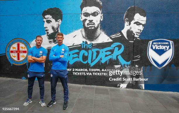 Scott Jamieson and Dario Vidosic of City pose in front of a street art installation during a Melbourne City FC A-League media opportunity at...