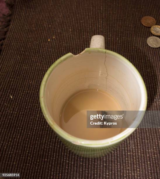 europe, uk, great britain, england, london area, 2018: view of cup of tea in lucky broken mug - broken mug stock pictures, royalty-free photos & images