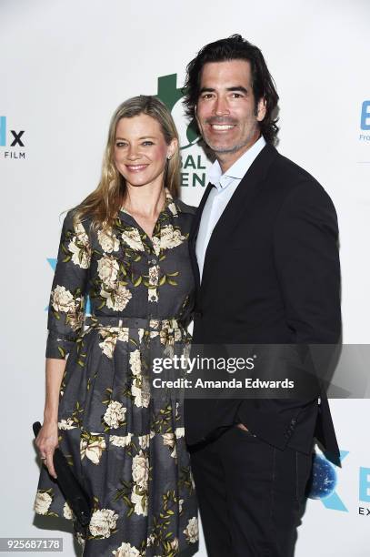 Actress Amy Smart and television personality Carter Oosterhouse arrive at the 15th Annual Global Green Pre-Oscar Gala on February 28, 2018 in Los...