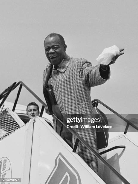 American trumpeter, composer and singer Louis Armstrong arrives in Leeds, UK, 18th June 1968.