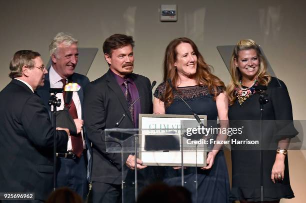 Honorees Richard Adams, Lisa Laughner and Ashley Grosh accept the Climate Resilience Award onstage during the 15th Annual Global Green Pre Oscar...