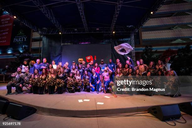 The Vegas Golden Knights cheerleaders, UFC Fighters, USA Sevens, and Nascar drivers pose during the Ultimate Sports Weekend Pep Rally at Toshiba...