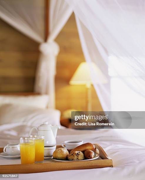 breakfast in bed - room service stock pictures, royalty-free photos & images