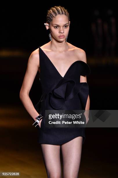 Hiandra Martinez walks the runway during the Saint Laurent show as part of the Paris Fashion Week Womenswear Fall/Winter 2018/2019 on February 27,...