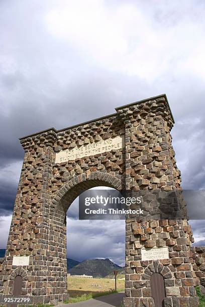 entrance gate to yellowstone national park - dedication brick stock pictures, royalty-free photos & images