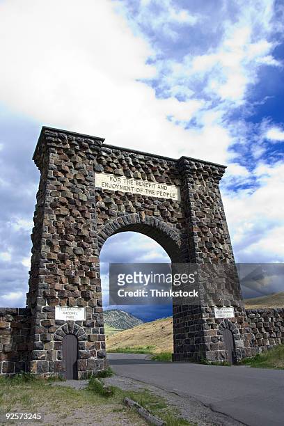 entrance gate to yellowstone national park - dedication brick stock pictures, royalty-free photos & images