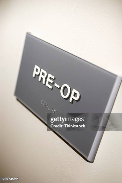 pre-op sign on wall - thinkstock fotografías e imágenes de stock