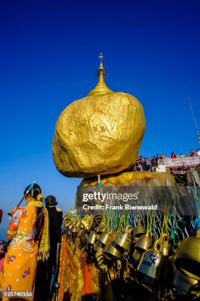 Many brass bells are tight at the Kyaiktiyo Pagoda, the Golden Rock, at the top of Mt. Kyaiktiyo, one of the most important pilgrimage sites of the...