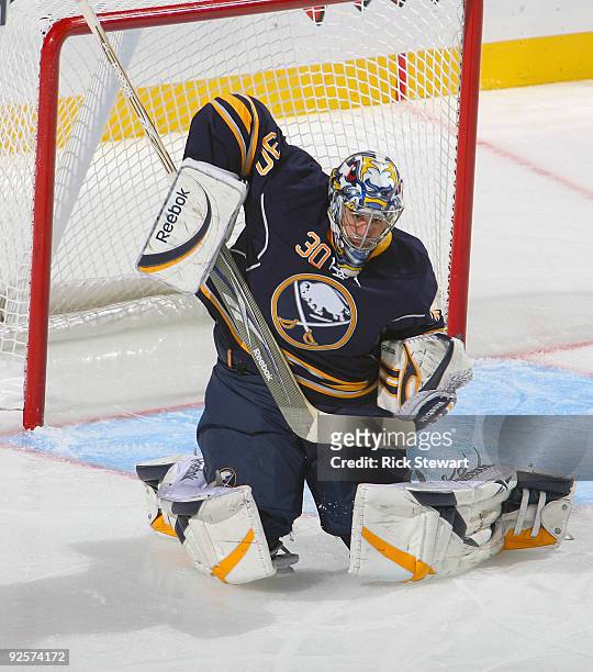 Ryan Miller of the Buffalo Sabres deflects the puck over the net against the Toronto Maple Leafs at HSBC Arena on October 30, 2009 in Buffalo, New...