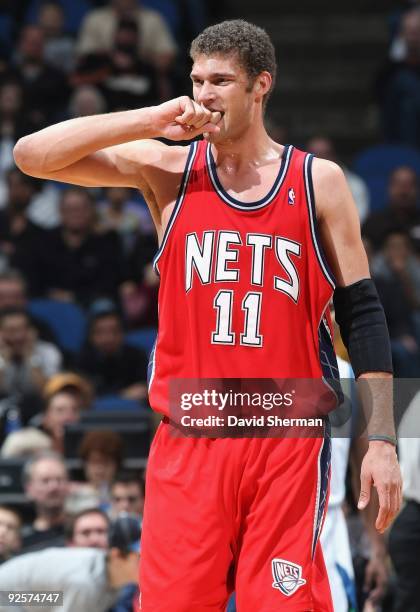 Brook Lopez of the New Jersey Nets reacts on the court during the season opening game against the Minnesota Timberwolves on October 28, 2009 at the...