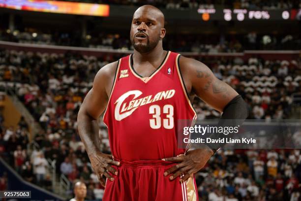 Shaquille O'Neal of the Cleveland Cavaliers looks on during the home opener against the Boston Celtics at Quicken Loans Arena on October 27, 2009 in...