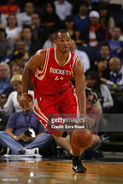 Chuck Hayes of the Houston Rockets dribbles the ball during their game against the Golden State Warriors at Oracle Arena on October 28, 2009 in...