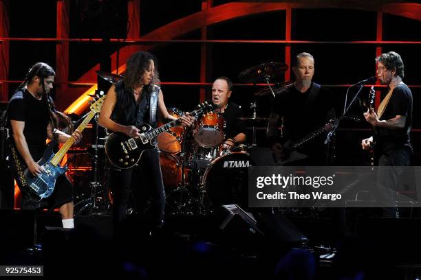 Robert Trujillo, Kirk Hammett, Lars Ulrich and James Hetfield of Metallica perform with Lou Reed onstage at the 25th Anniversary Rock & Roll Hall of...